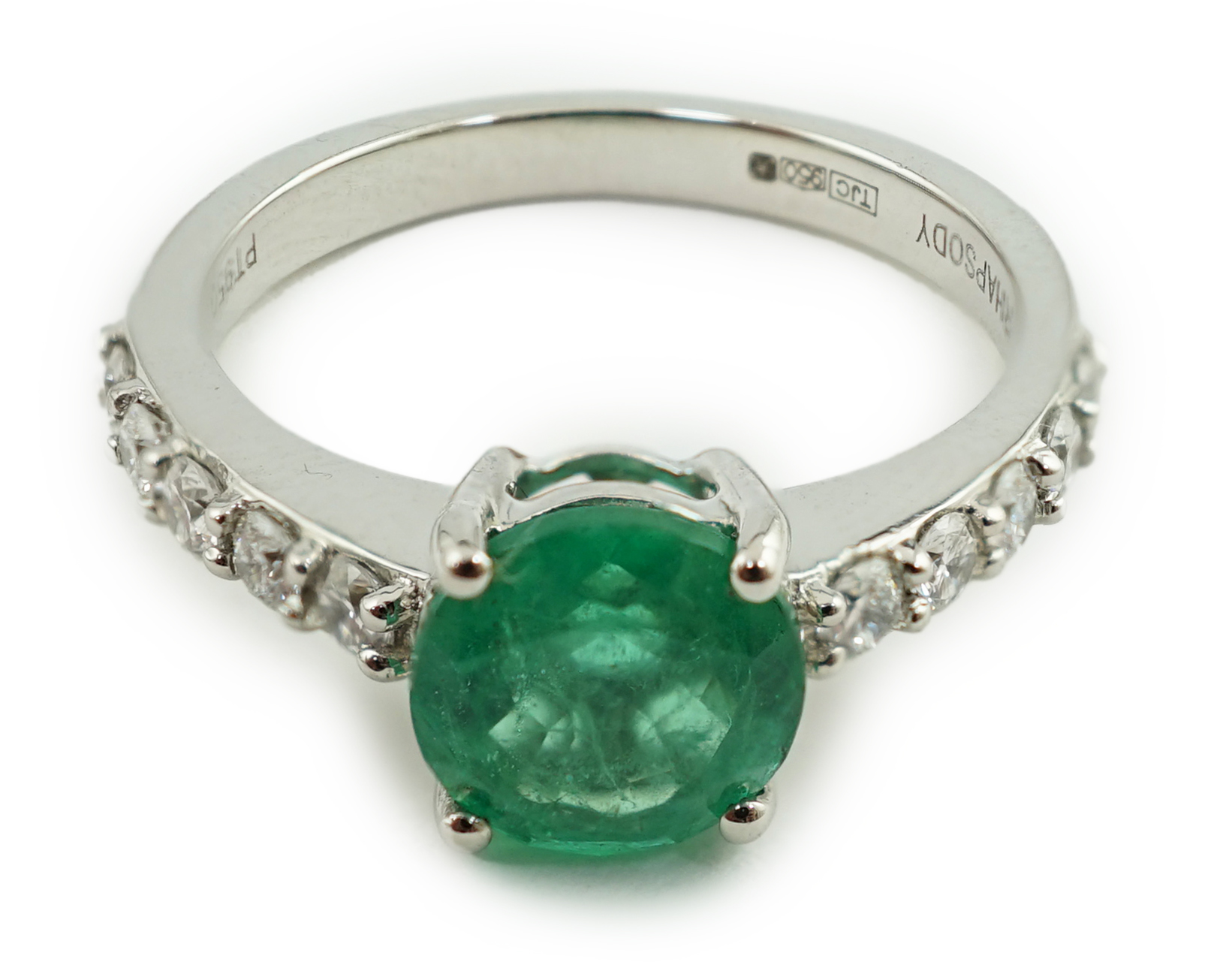 A modern Rhapsody platinum and single stone round cut emerald set ring